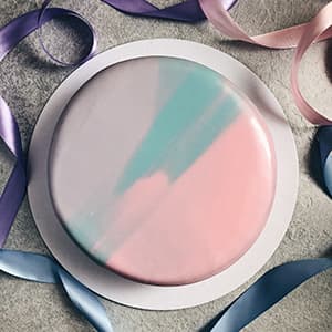 Mousse cake with colorful mirror glaze