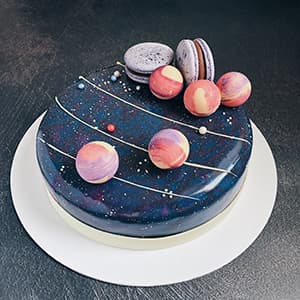 Galaxy cake with chocolate spheres